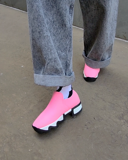 iRi WES Pink Sneaker Video on a model walking along the street